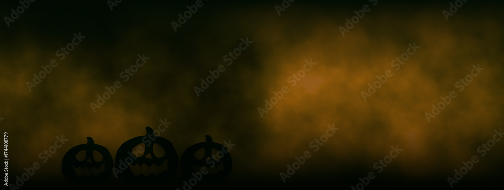 Obraz premium Carved pumpkin jack o lantern faces on orange smoke foggy mist background