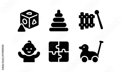 Silhouette icons of classic baby toys: cube, stacking rings, xylophone, smiling baby, puzzle, and duck push toy