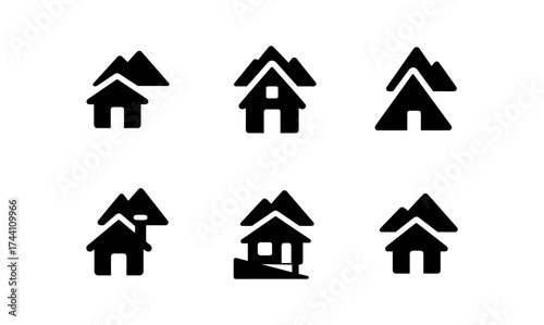 Minimalist mountain cabin icons in black silhouette design