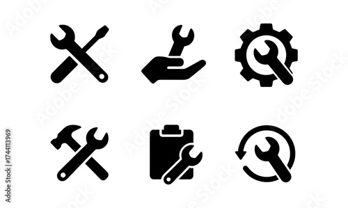 Set of black repair icon designs for maintenance and tools