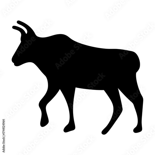 Vector art of silhouette of a chamois, a surefooted goatantelope native to mountainous regions, standing in profile view