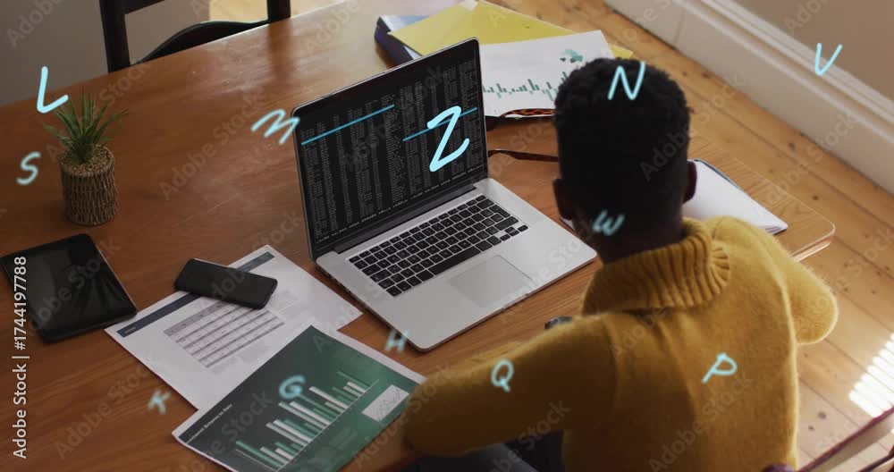 Tech developer leaning over laptop executing code with animated letters ...