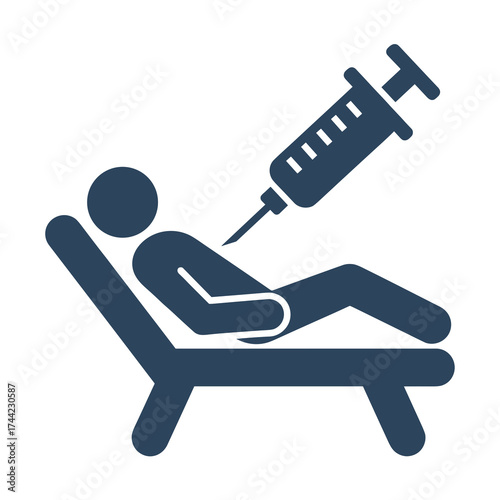Person receiving injection while lying on a recliner