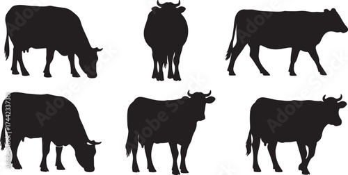 Illustration of silhouettes of cows grazing in vector format