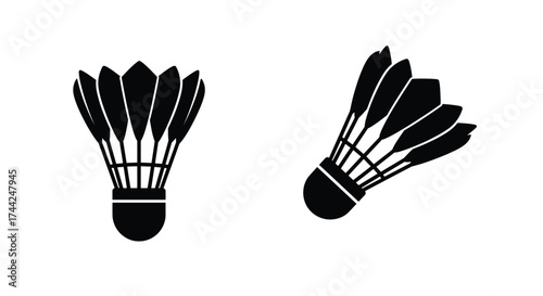 Simple black and white illustration of two badminton shuttlecocks displayed closely