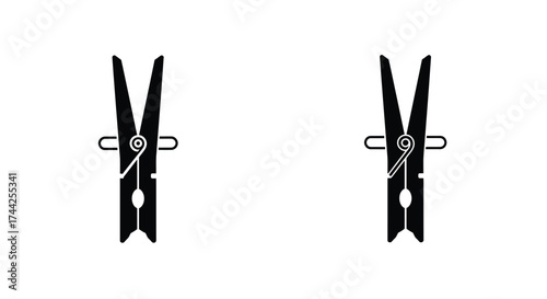 Two black clothespins with metal springs shown in a simple illustration