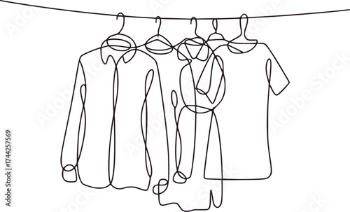 Clothing hanging on a clothesline garments apparel