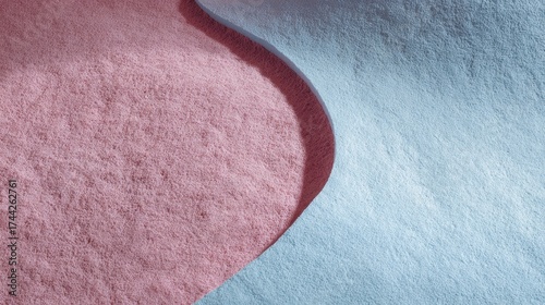 Abstract textured surface with subtle granular materials creating a soft wavy division