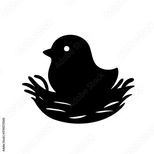 Silhouette of a little bird nestled comfortably in a cozy handmade nest