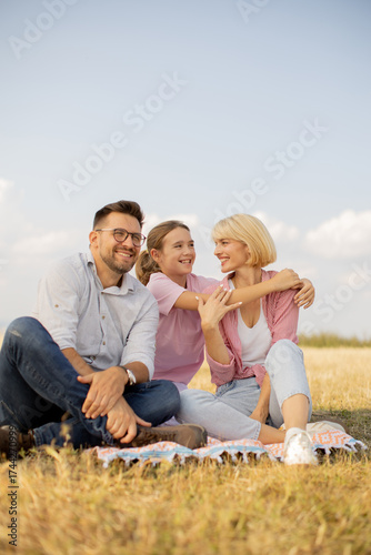 Family enjoying a sunny pic...