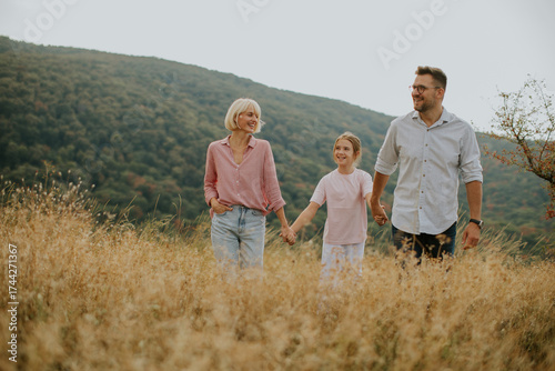 Family enjoying a walk toge...