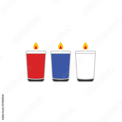 Votive candles burning brightly for solemn spiritual remembrance and commemoration of All Saints' and All Souls' Day.