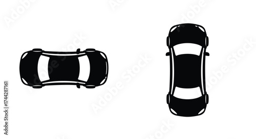 Two black car silhouettes viewed from directly above simple illustration