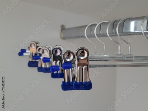 Hanger with clips for hanging clothes. Clothes-hanger for trousers and skirts securely. No label, mock up templ