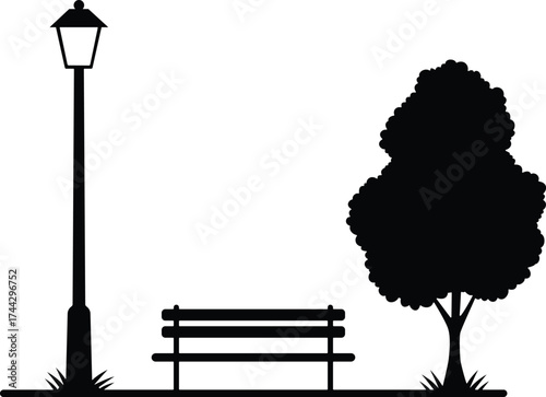 A park bench and a tall street lamp stand beside a leafy tree in silhouette