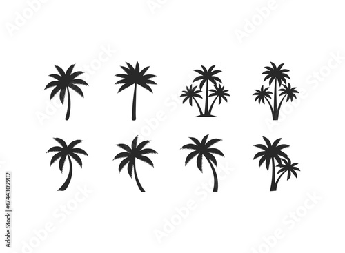 Set of black palm tree silhouettes