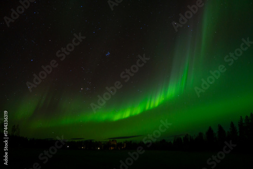 Aurora borealis Northern Lights fully covered the sky. Lapland amazing scenery