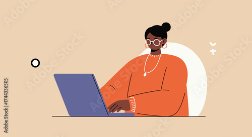 Focused woman using laptop for remote work online learning or digital tasks Modern lifestyle