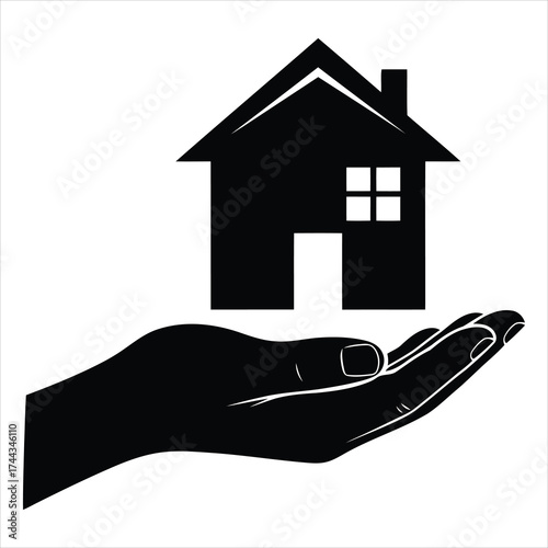 Silhouette of a house held in an open hand, isolated on white background
