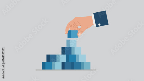 Hand placing building block for business growth and success strategy