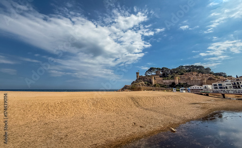 Tossa de Mar beach and the castle and its walls in the background. Girona, Spain
