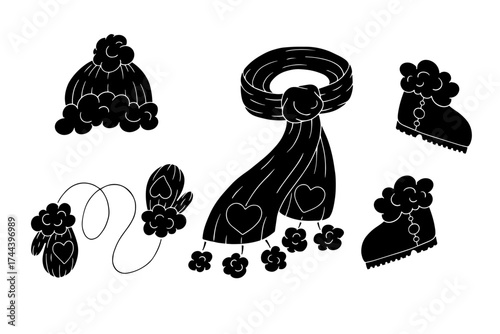 Set of stamps, silhouettes of winter clothing and accessories. Vector graphics.
