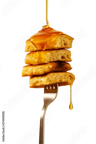 Stack of fluffy pancakes with dripping syrup on a fork, isolated background