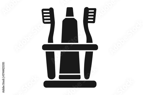 Silhouette of toothpaste tube with two toothbrushes on stand