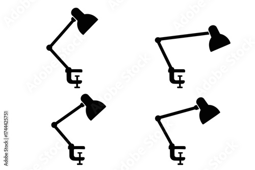 Silhouette of four adjustable desk lamps with clamps