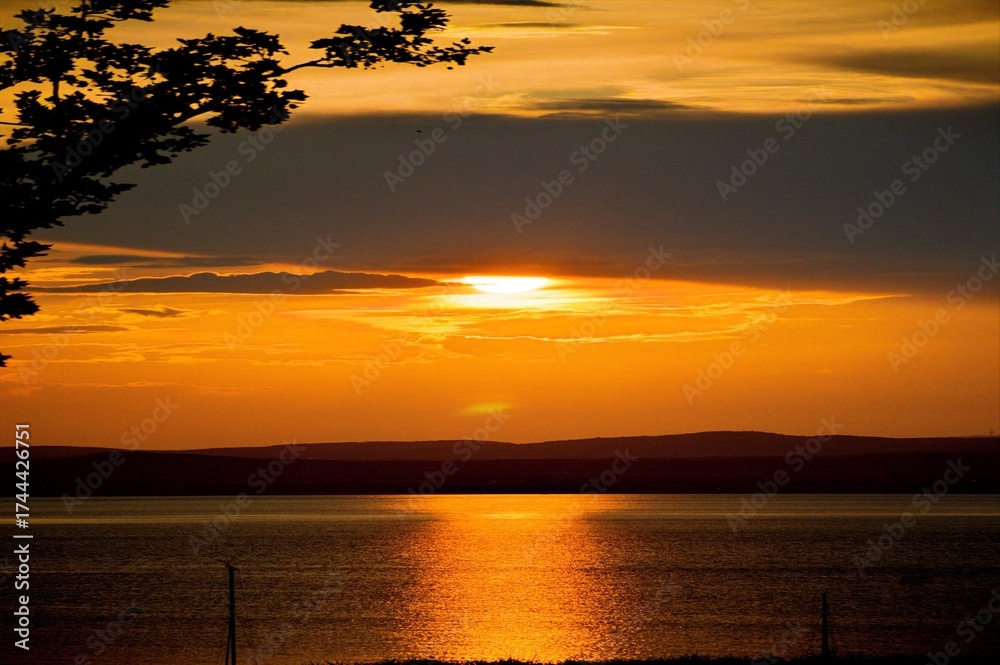 Fototapeta premium sunset over the lake