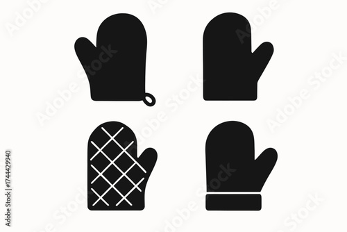 Set of four black silhouette mittens on white background