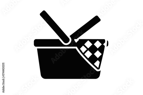 Simple black and white picnic basket icon with checkered cloth design