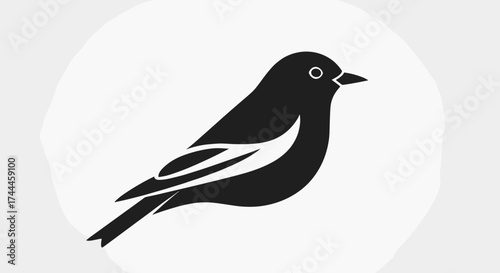 Black and white bird silhouette on a light background simple and elegant design.