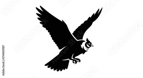 Black and white silhouette of an owl in flight captured against a plain background showcasing its powerful wingspan and sharp talons.