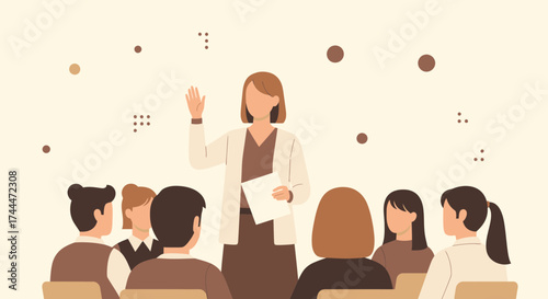 A woman giving a presentation to a group of people during a seminar or training session