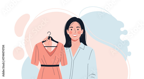 A Woman Holding Dress Smiling While Looking, Fashion And Woman Concept For Shopping