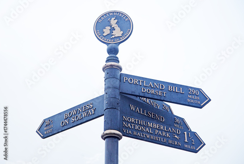 A direction sign in Haltwhistle, Northumberland showing that it is equidistant between the northern and southern limits of Britain (Portland BIll and the Orkneys) and is in the centre of Britain