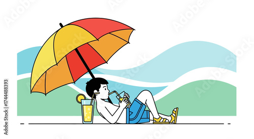 Boy relaxing under an umbrella on a sunny day at the beach with refreshing drink