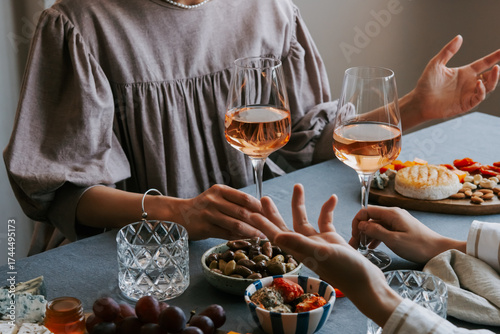 Glasses of rose wine seen during a dinner party of a celebration.