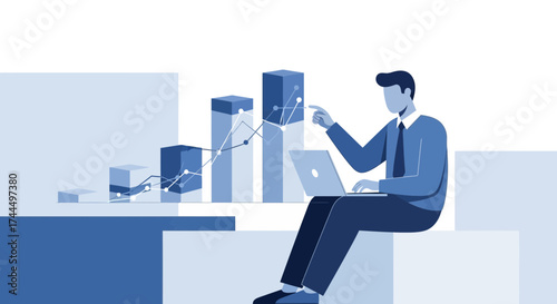 Businessman Analyzing Data with Laptop and Pointing to a Rising Bar Chart