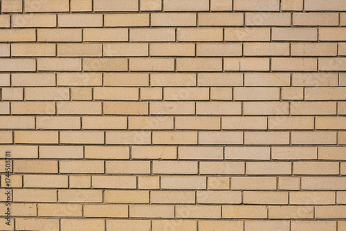 beige brick wall texture with clean horizontal lines, creating a simple geometric pattern ideal for architectural backgrounds or design use.