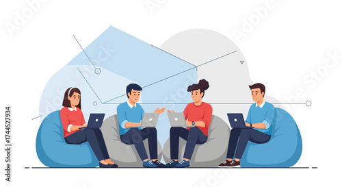 Diverse group working together on bean bag chairs with laptops in modern office
