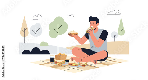 Enjoying A Picnic Amidst Nature: A Relaxed Moment Of Outdoor Mealtime Bliss