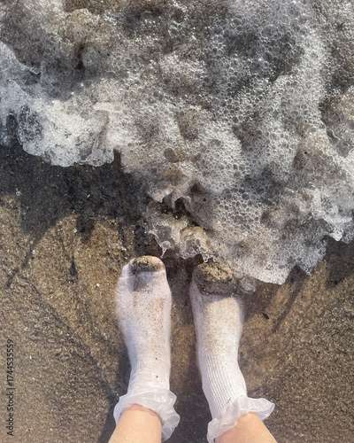 Odd Unusual Person with Wet Socks at Beach