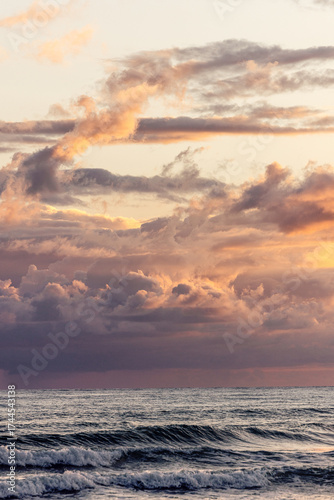 Dramatic Clouds Over Ocean Waves