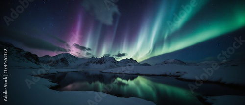 stunning blue aurora borealis over snowy mountain range at night | travel, astronomy, scenery, wilderness, relaxation theme