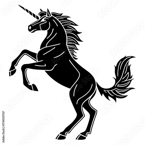 Majestic black unicorn rearing up on hind legs