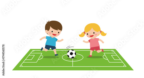 Kids play soccer on a green field boy in blue girl in pink