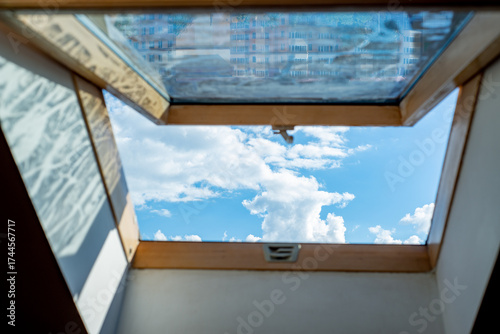 Blue sky view from loft roof window