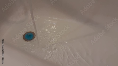 Water in the bathroom. Water is collected in the bathroom.